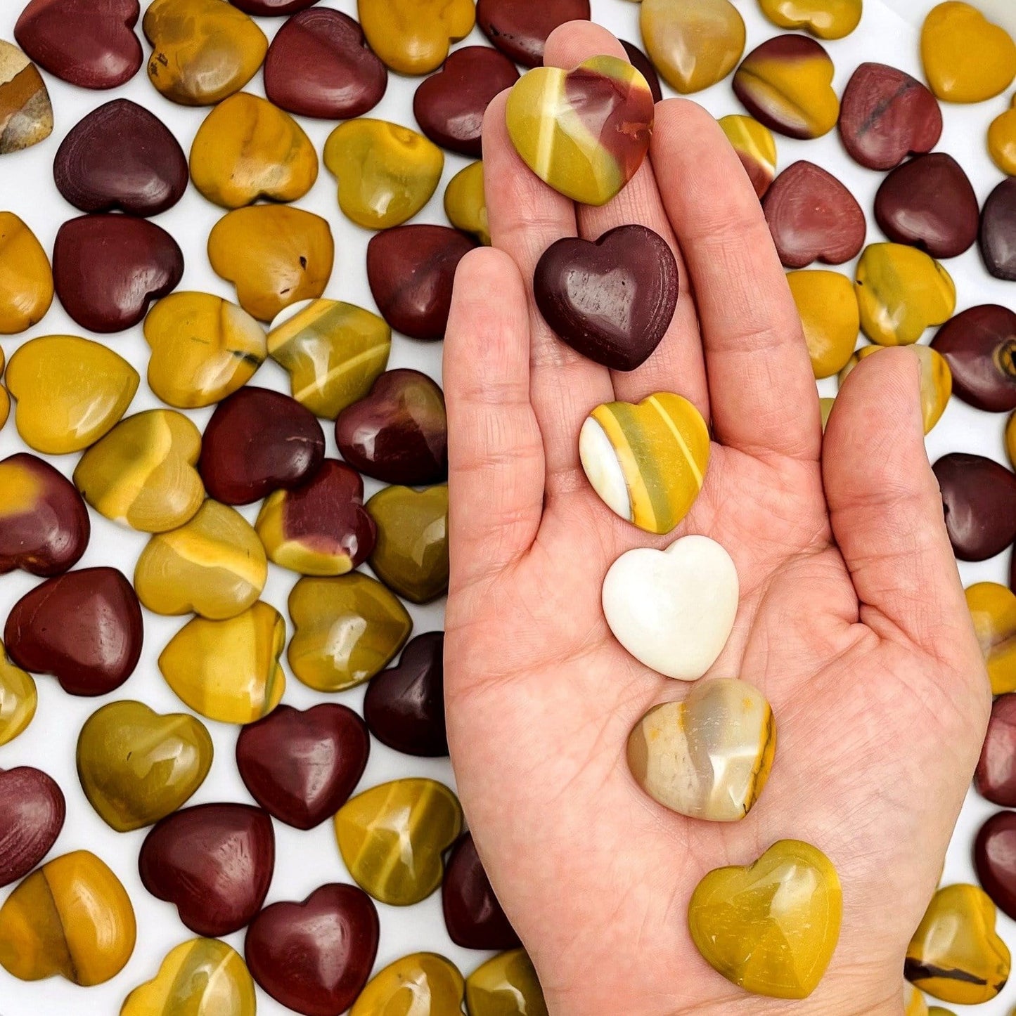 mookaite hearts in a hand