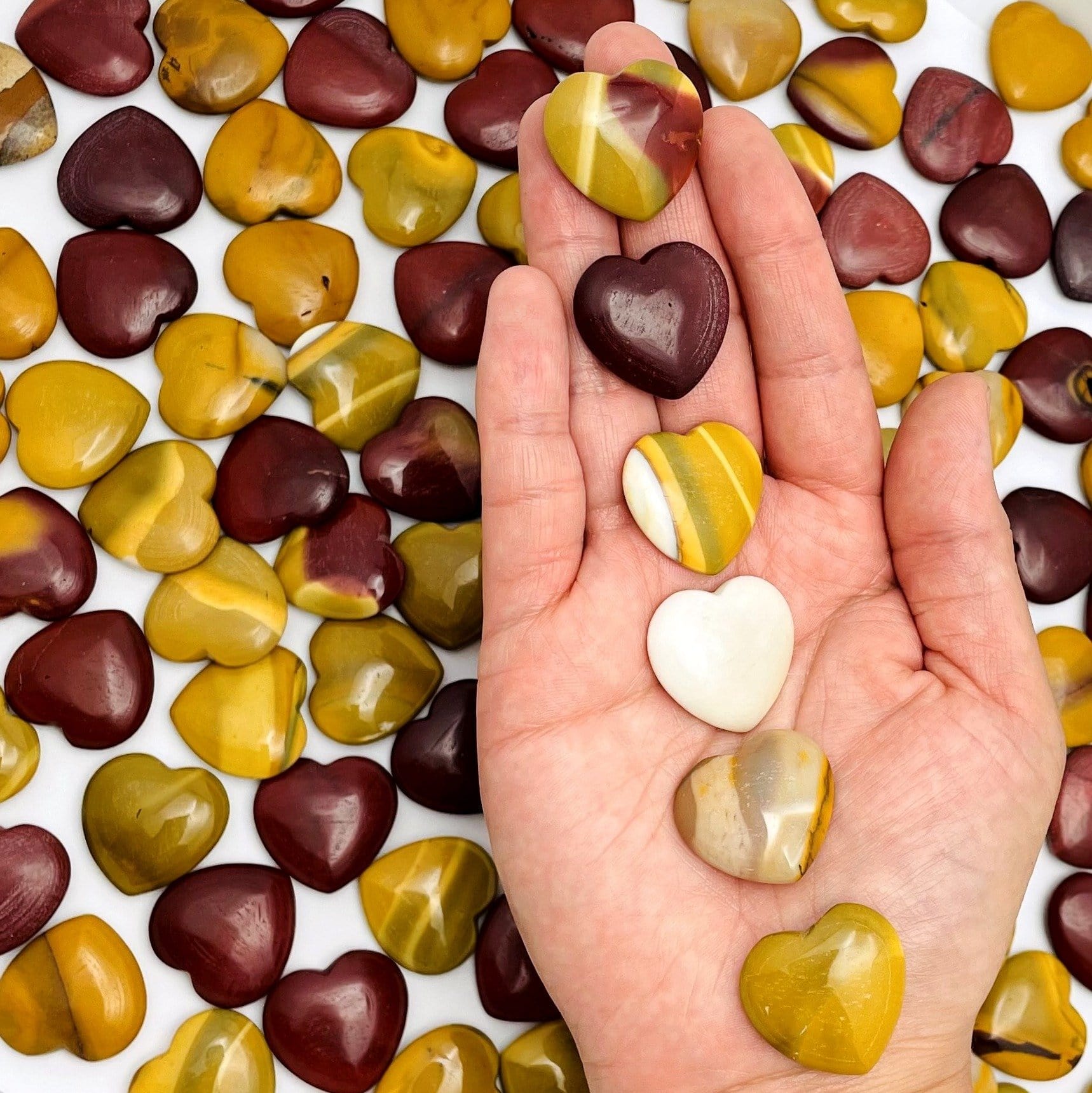 mookaite hearts in a hand