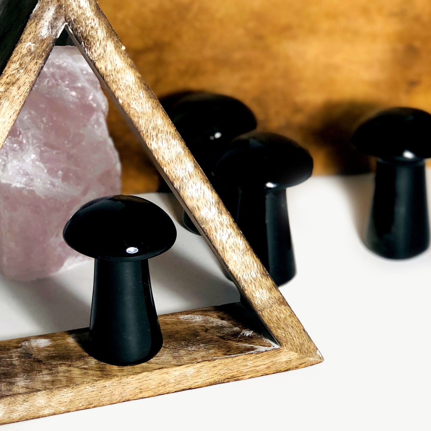 Gold Sheen Obsidian Polished Mushroom displayed to show the black without sheen
