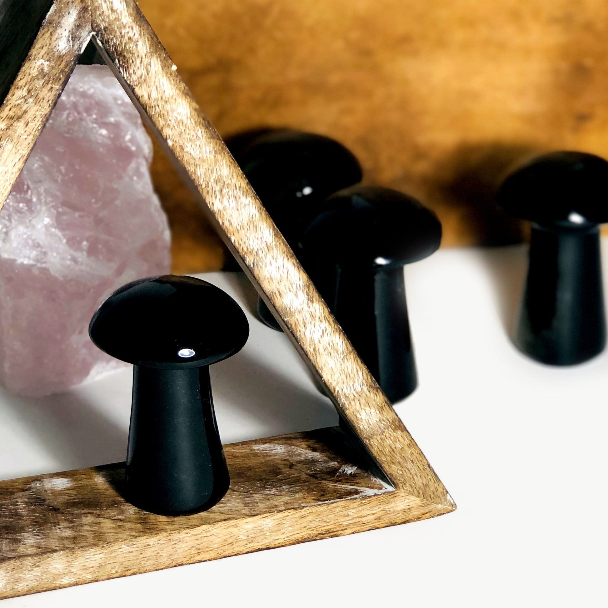 Gold Sheen Obsidian Polished Mushroom displayed to show the black without sheen