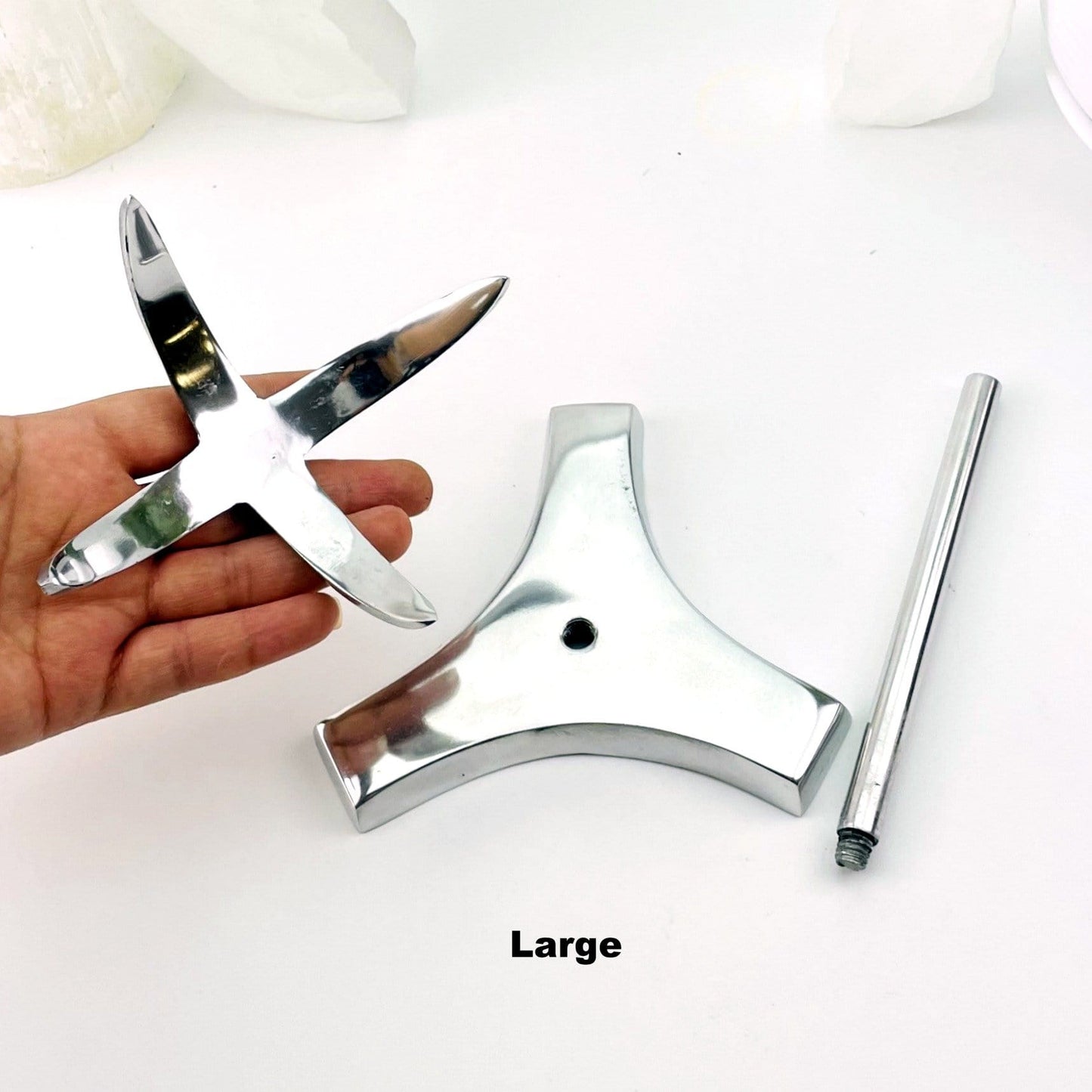 The large sphere stand shown in the three parts it comes in when it is shipped.