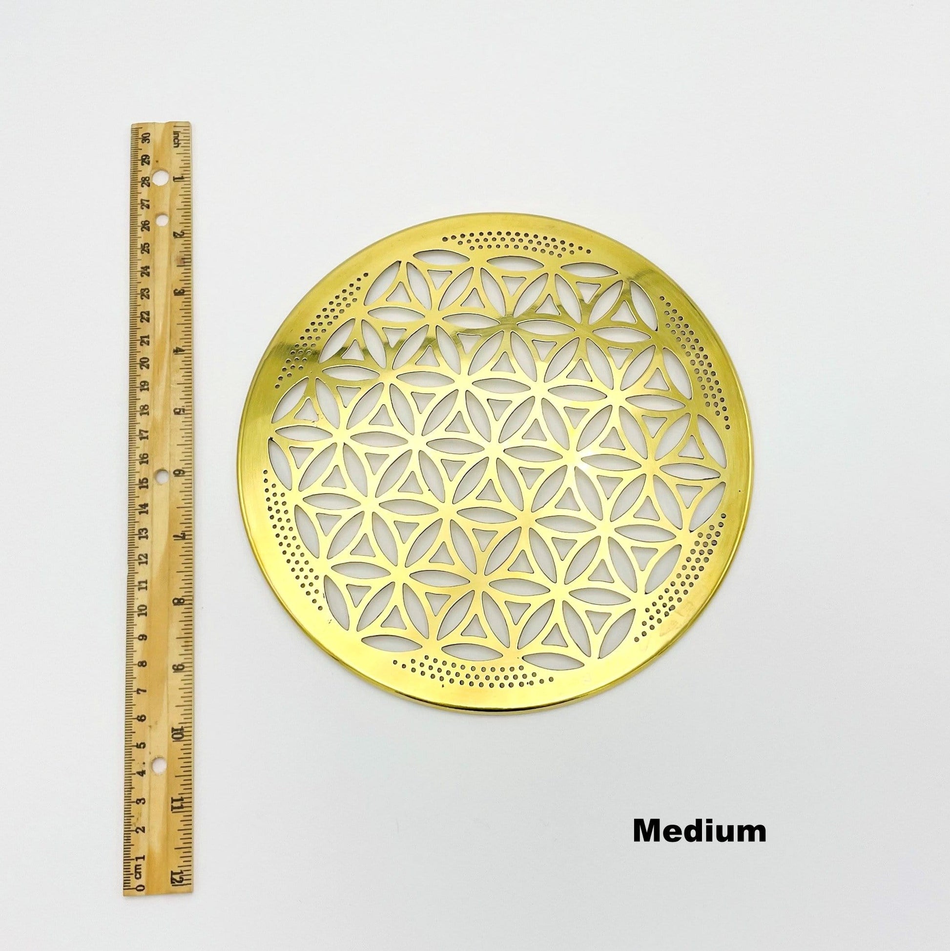 flower of life grid available in medium size. displayed next to a ruler for size reference