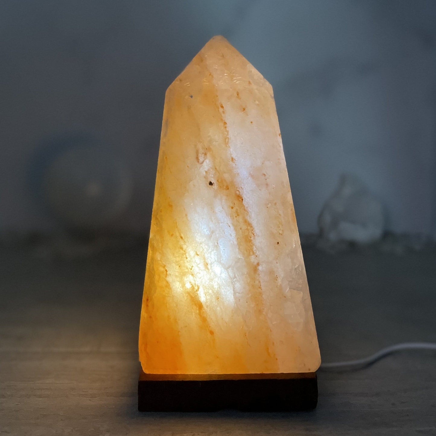 salt lamp turned on to show how it illuminates