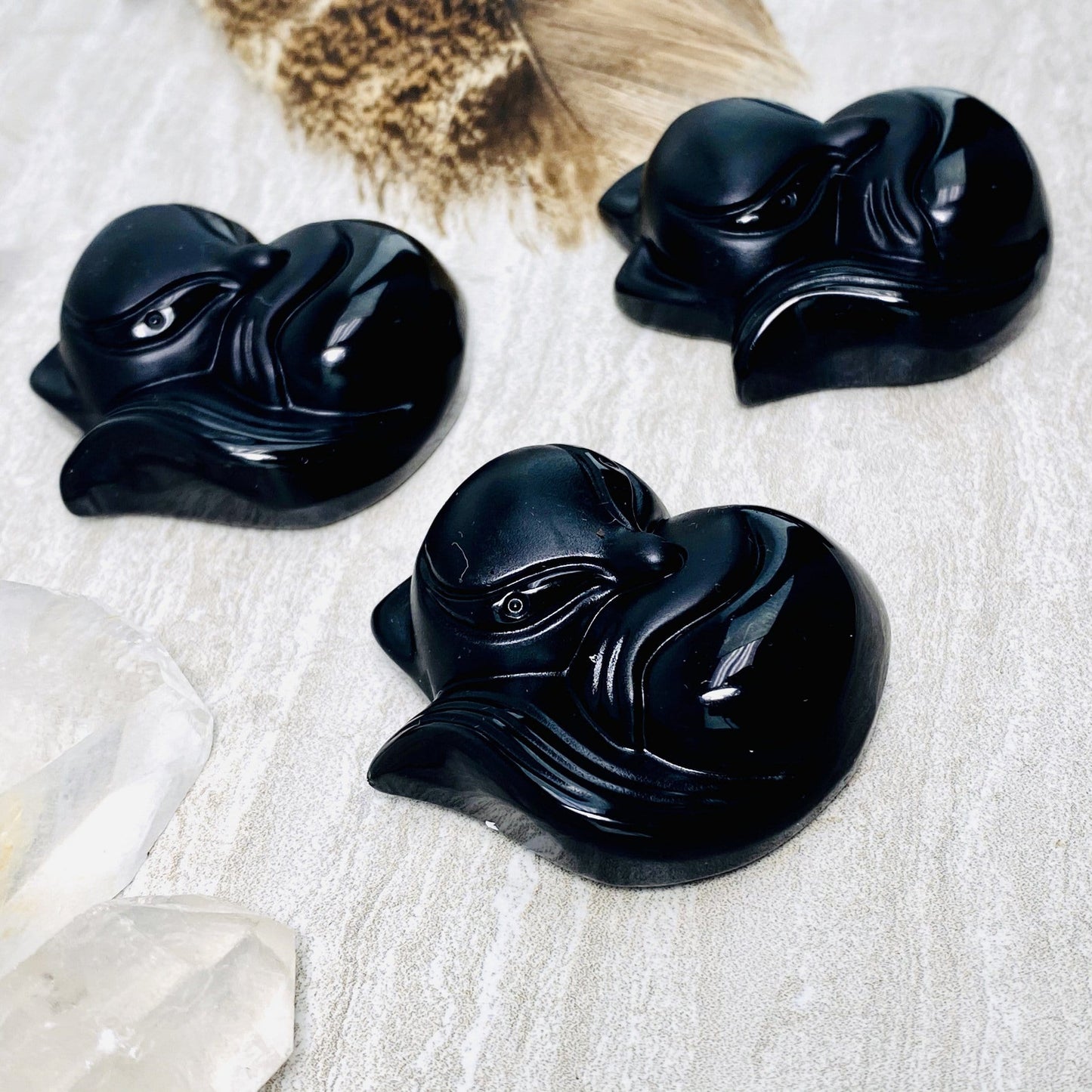 black onyx fox beads on a table
