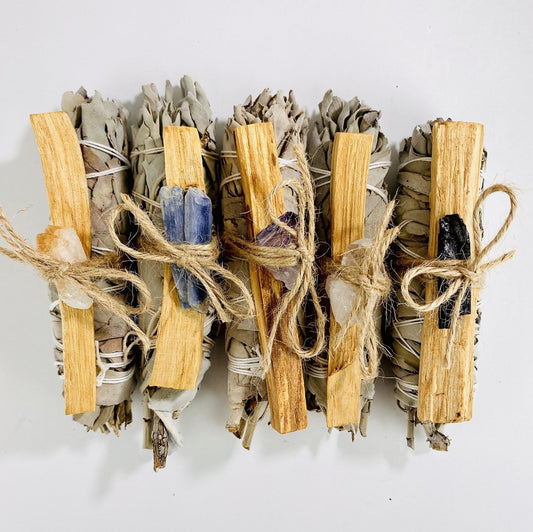 sage bundle palo santo with assorted stone options on display