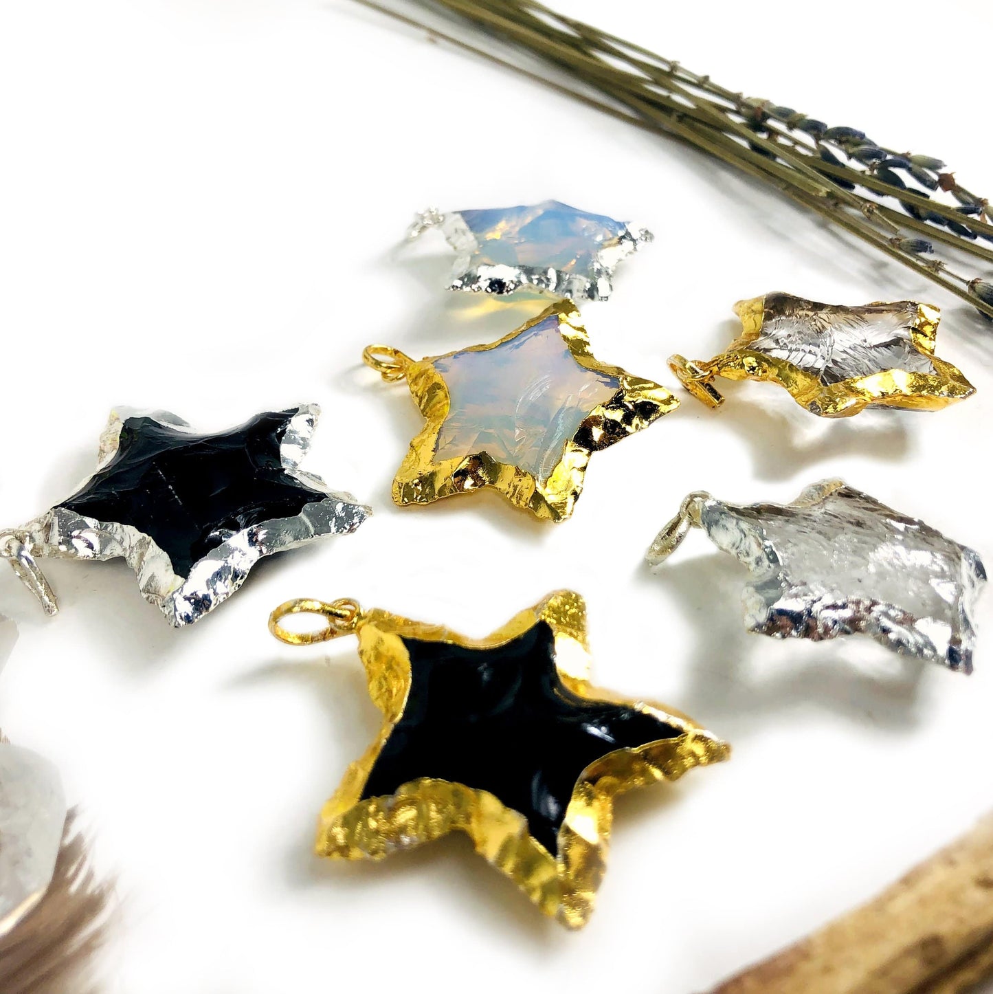 star electroplated pendants with decorations in the background
