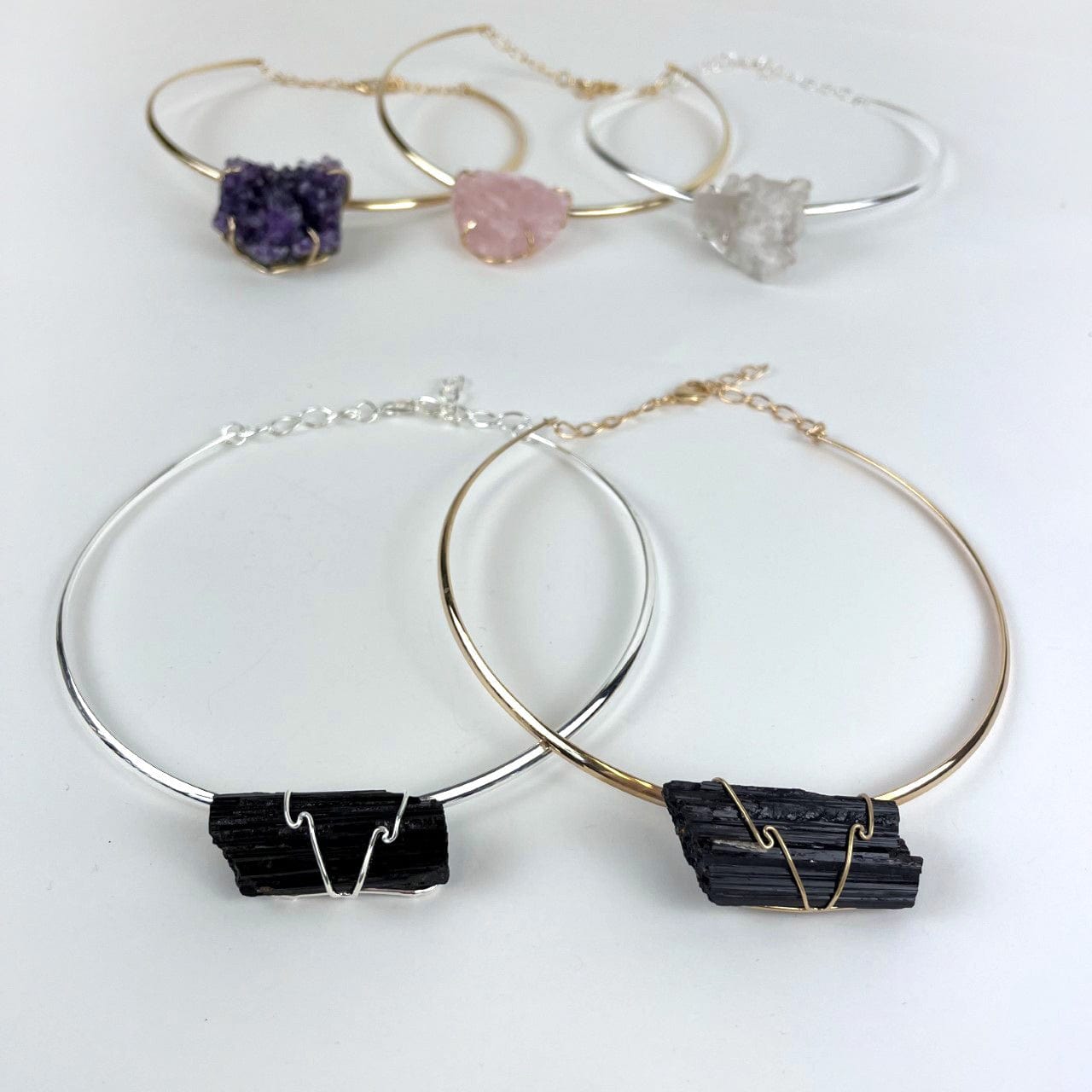 Tourmaline choker in gold and silver up close with others options in background