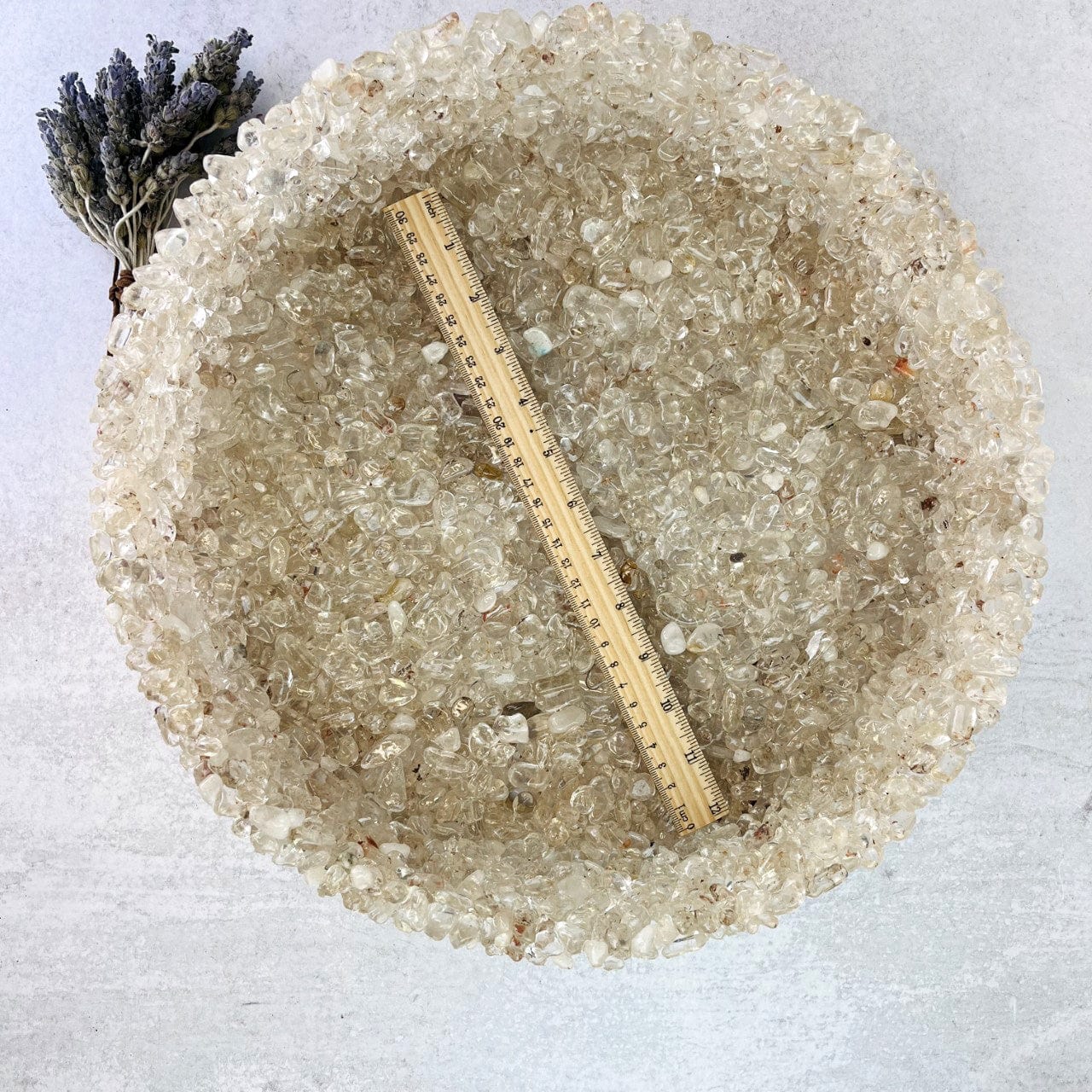 a bowl with a ruler in it