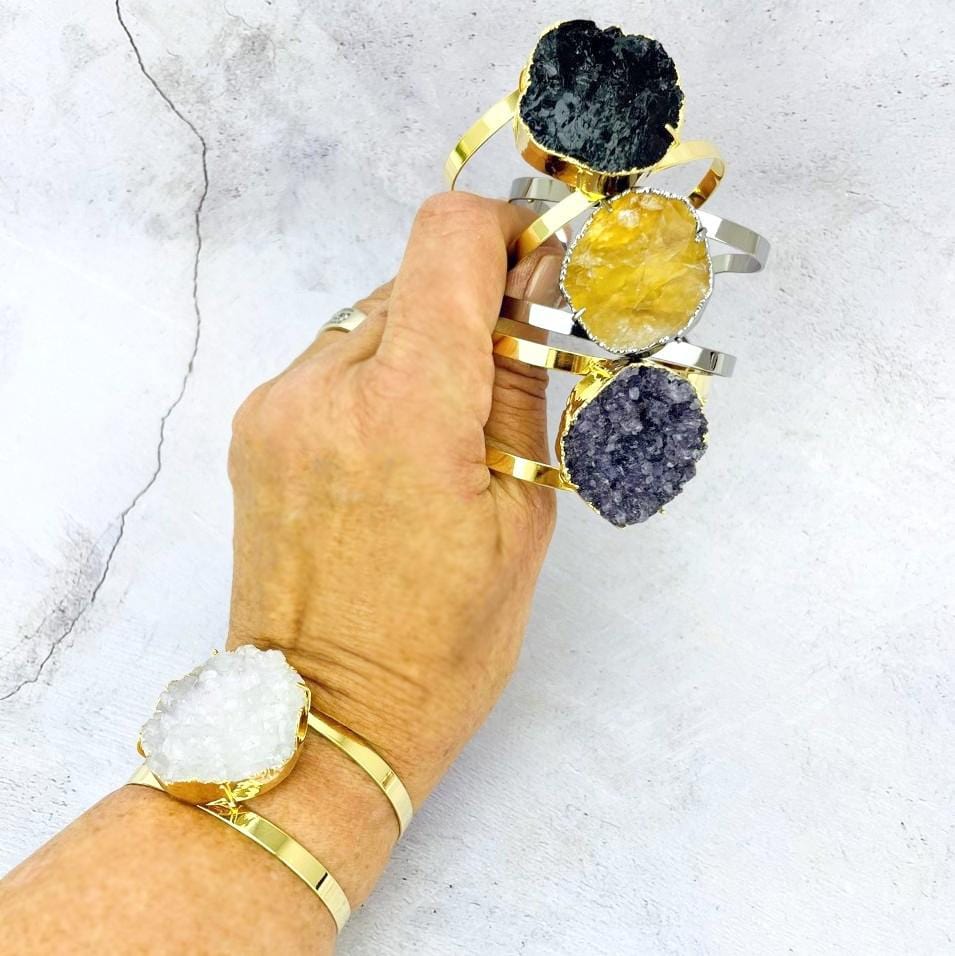 stone bracelets in a hand