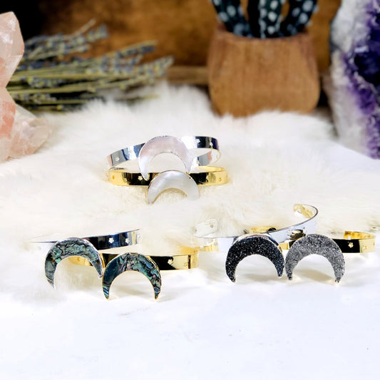moon bracelets on a table