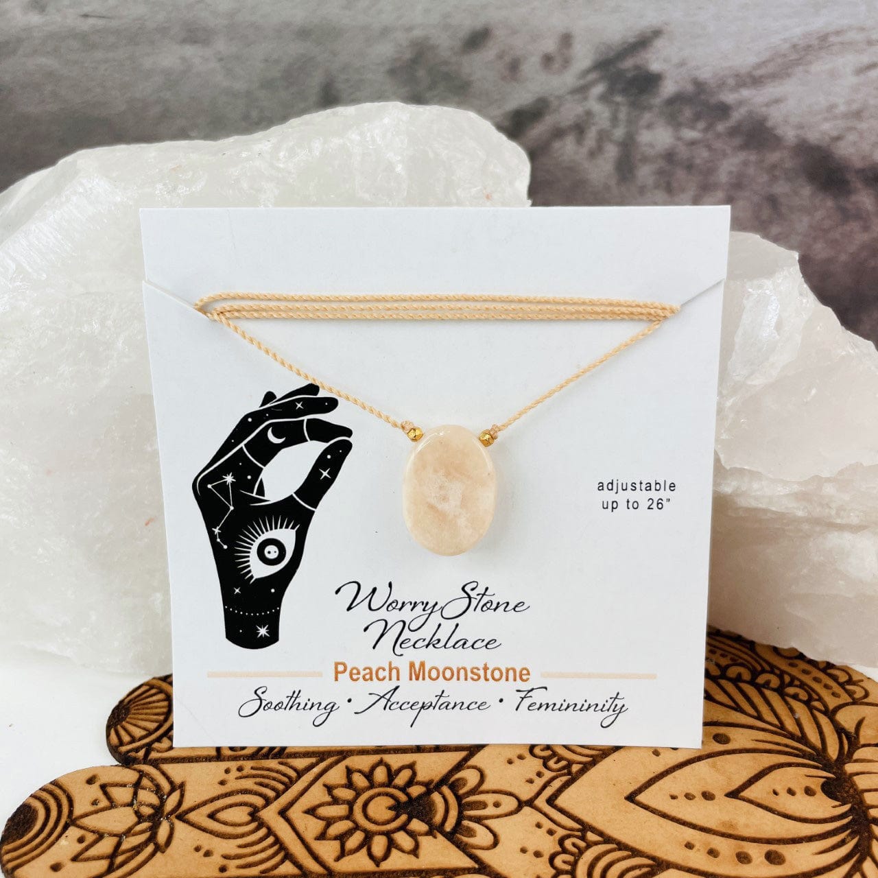 Peach moonstone worry stone necklace carded for display