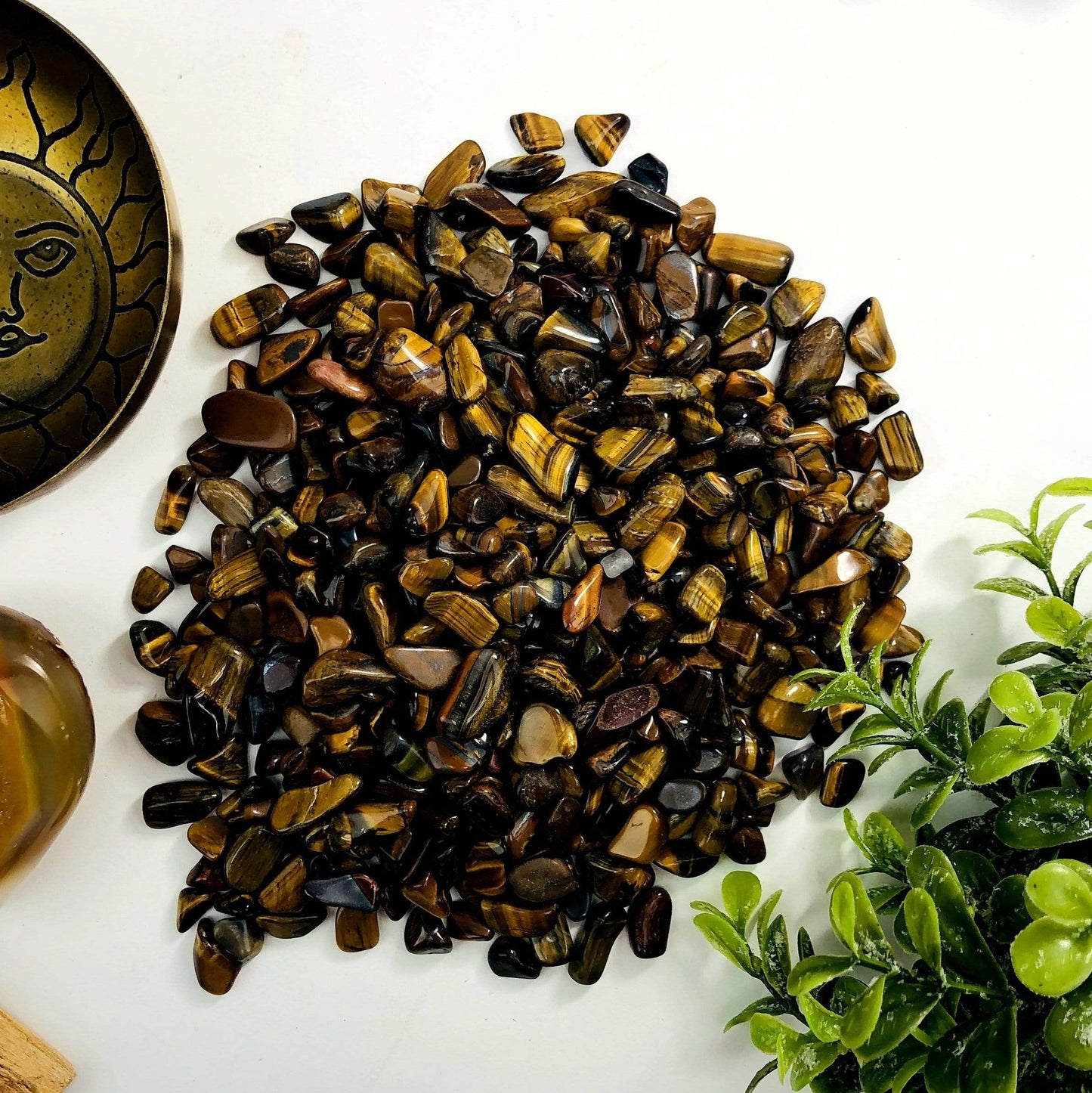 Small Tumbled stones displayed to show the differences in the sizes 