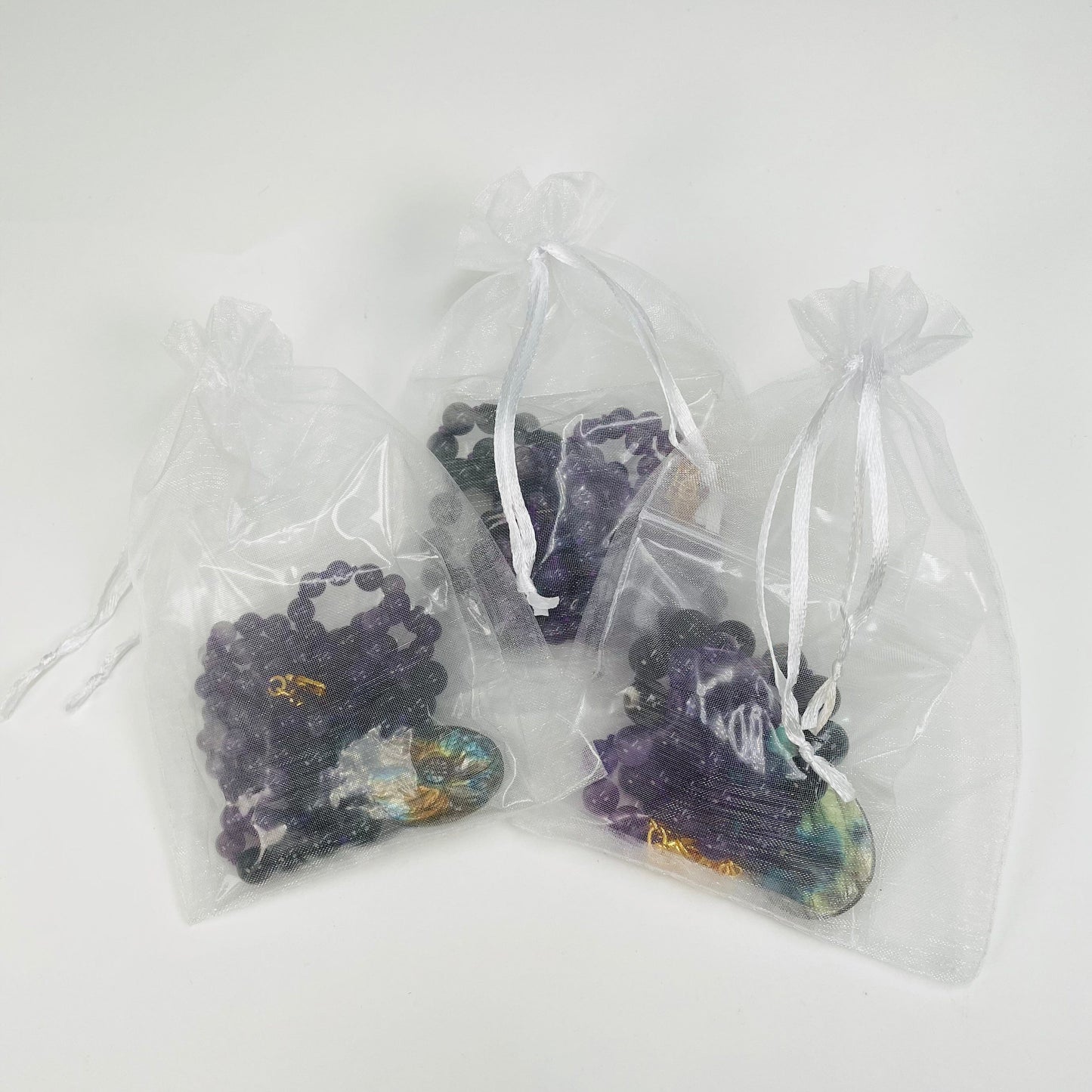 each necklace comes in  a felt pouch 