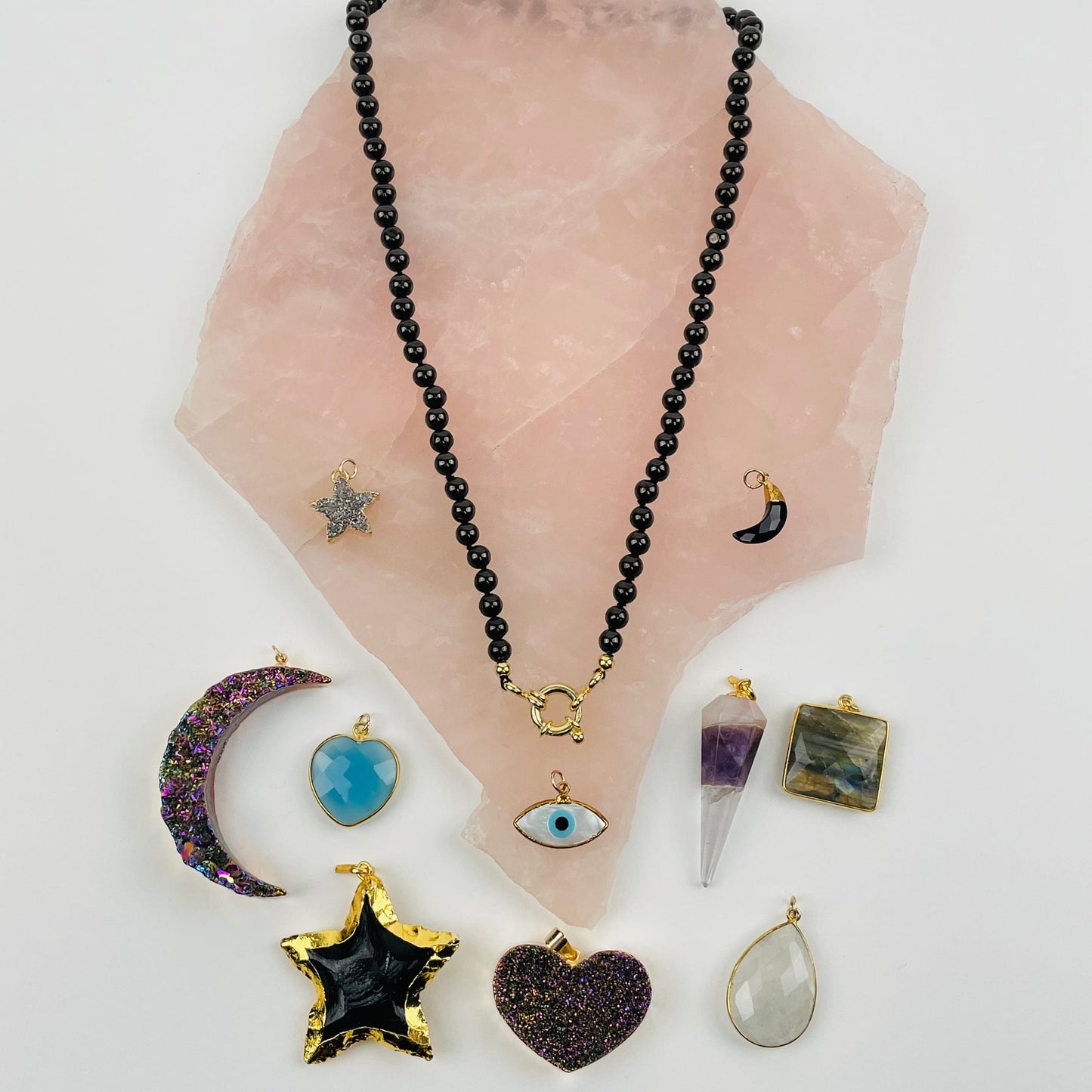 Shungite Candy Necklace with charms around it