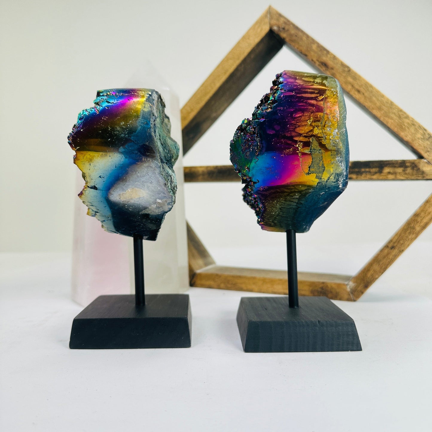 titanium coated heart on stand with decorations in the background