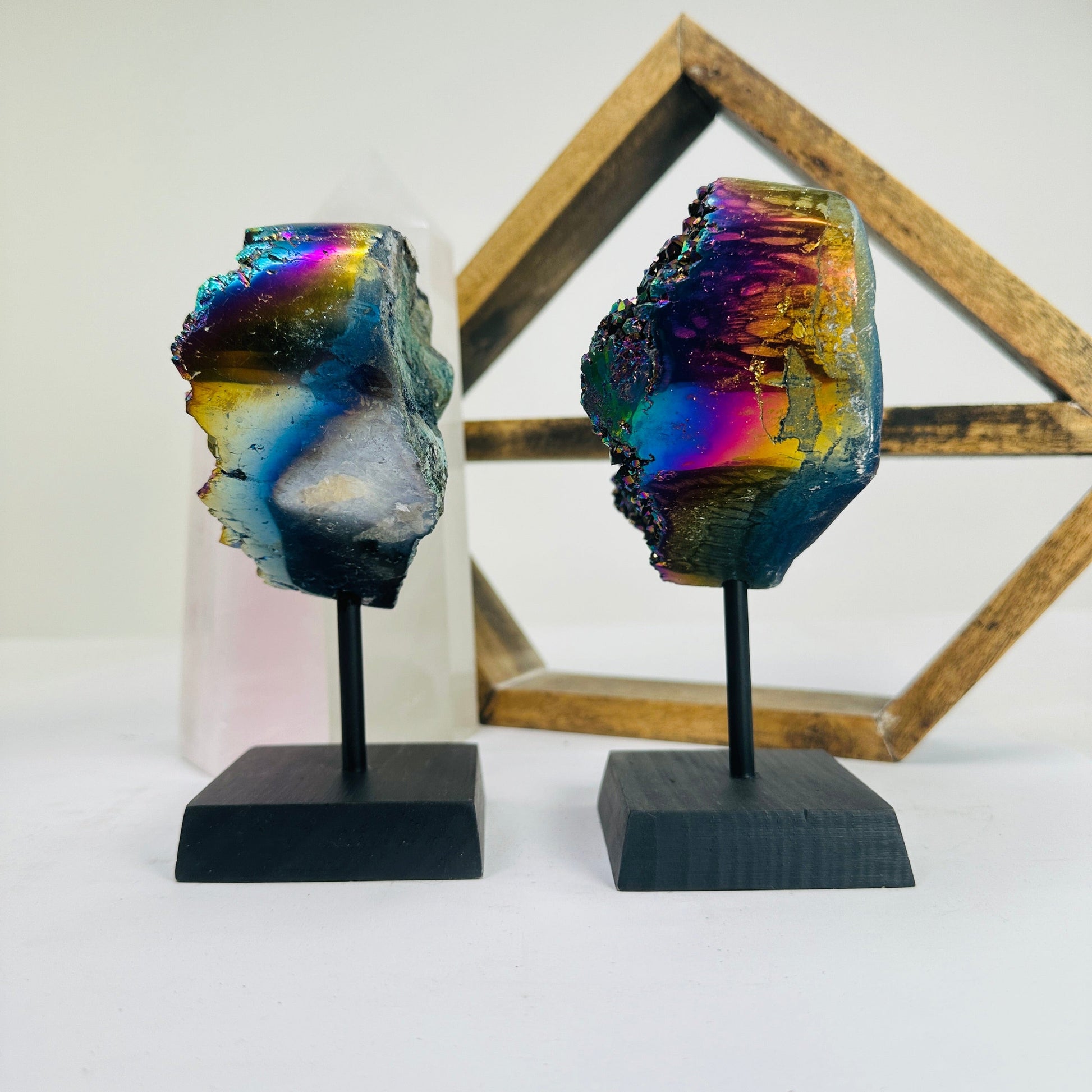 titanium coated heart on stand with decorations in the background