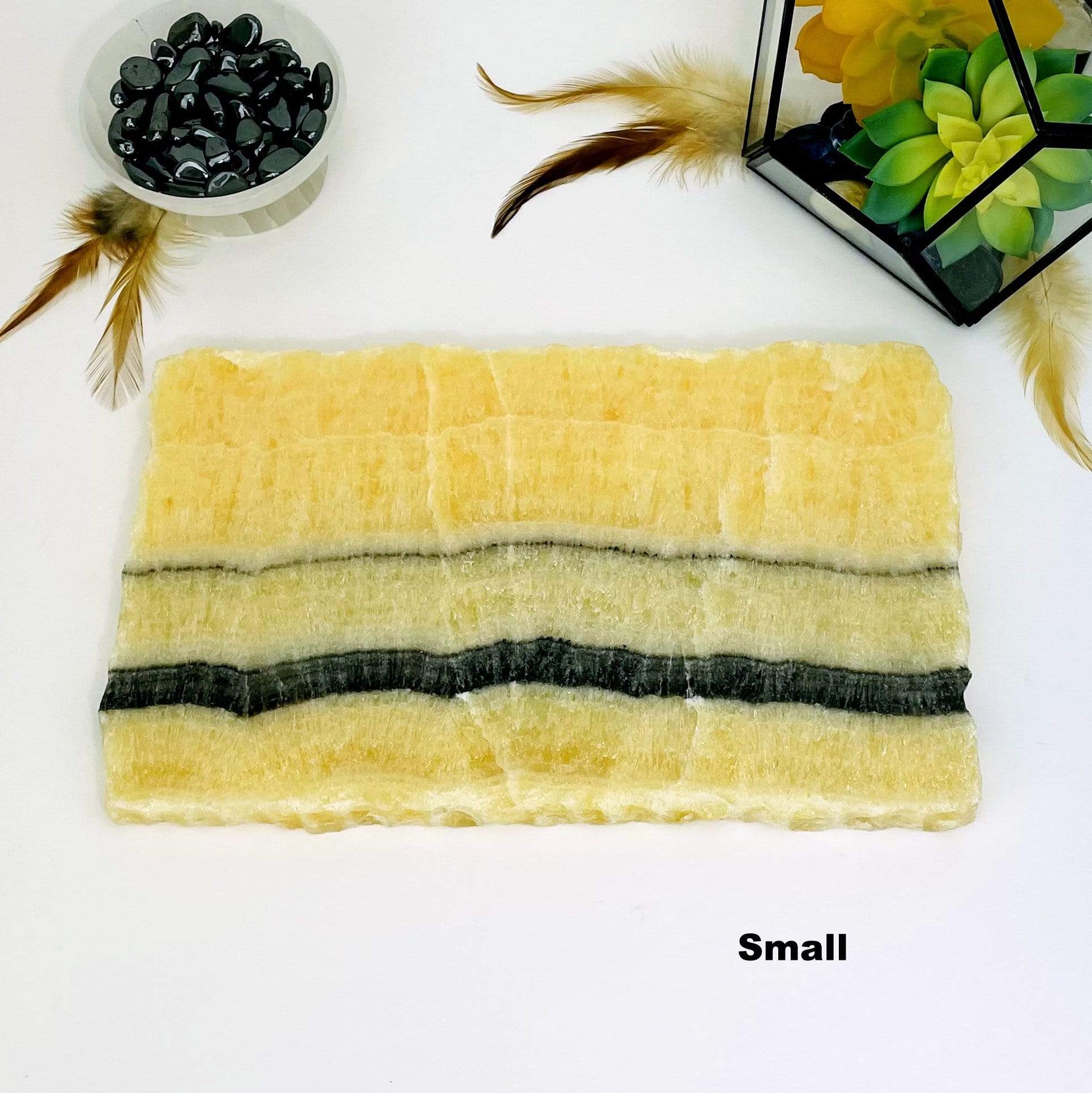 small Mexican onyx platter with decorations in the background