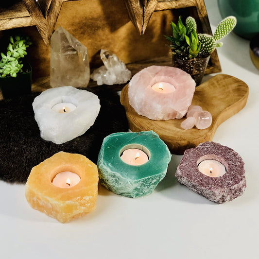 Rough Stone Candle Holder in different crystals with decorations in the background
