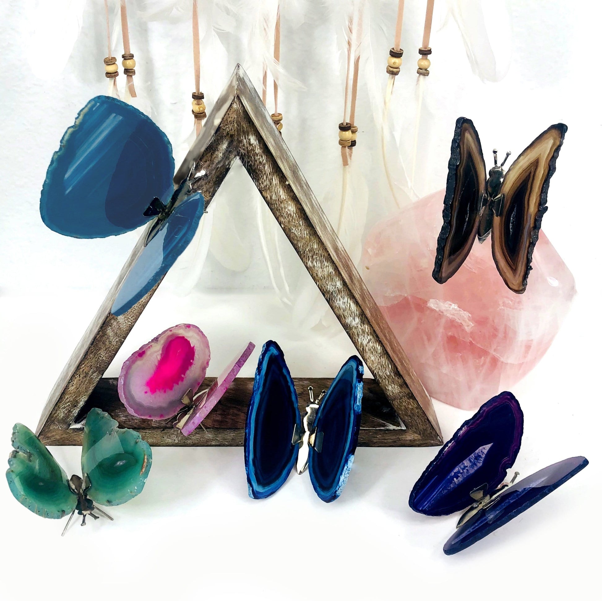 Agate Druzy Butterfly Stands in an alter.
