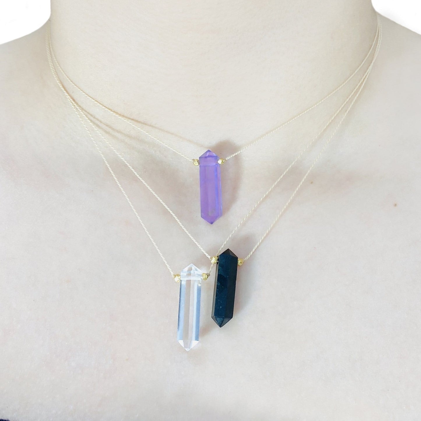 necklaces showing how they hang when worn 