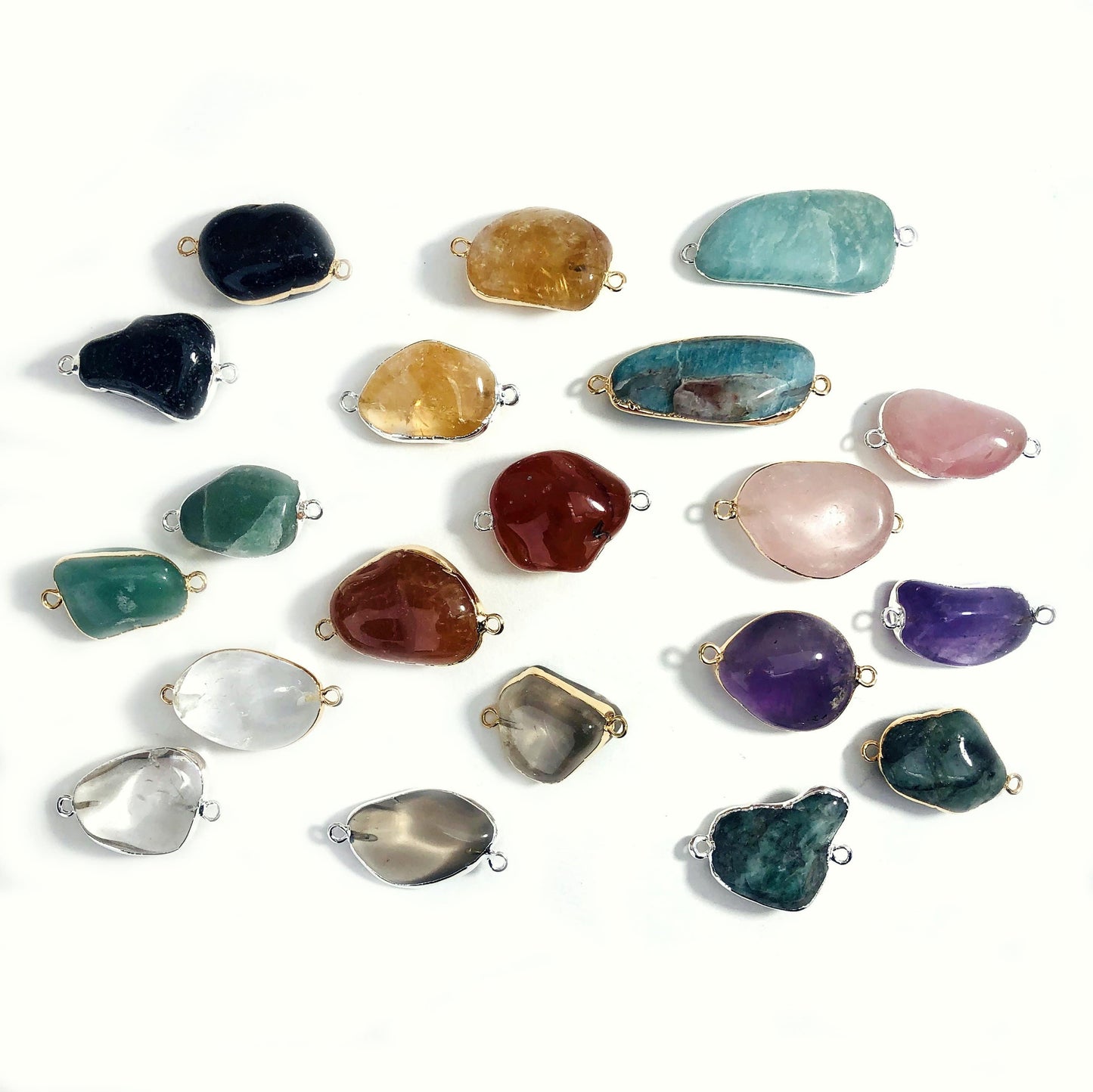 gemstone connector pendants on white background