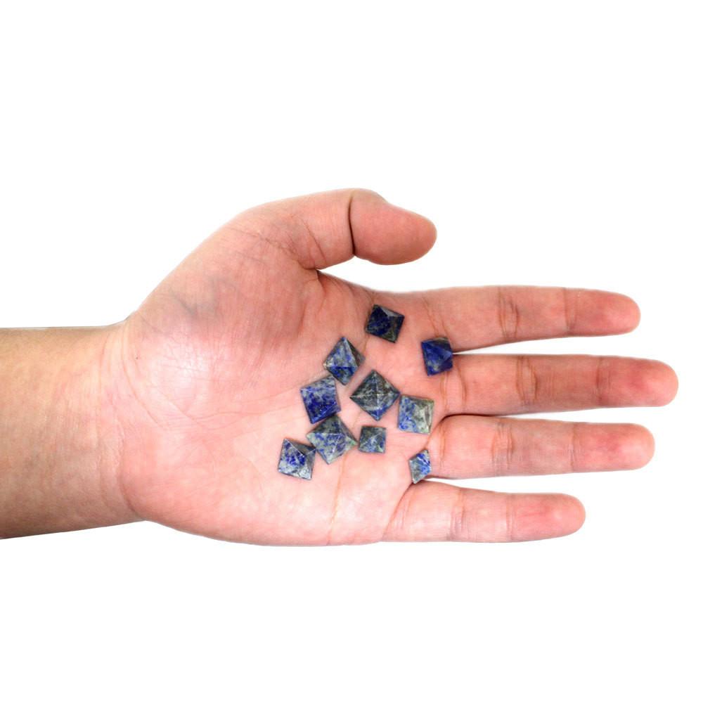 Bundle of Petite Lapis Pyramid in hand for size comparison