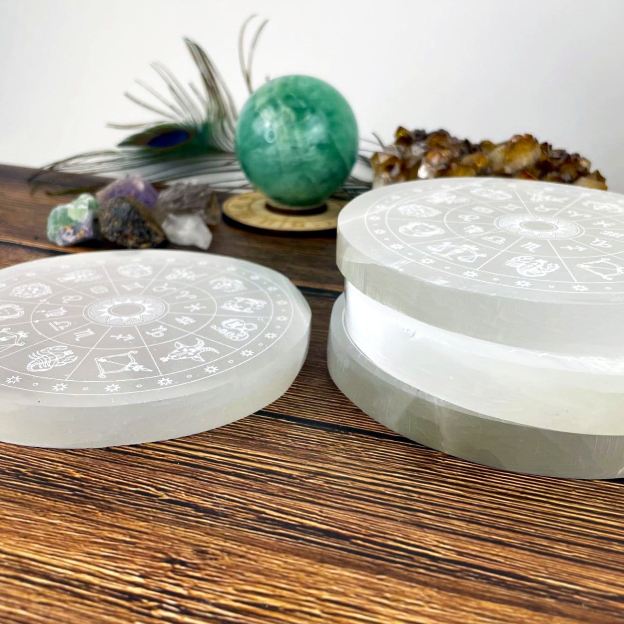 side view of selenite zodiac engraved charging plate for thickness