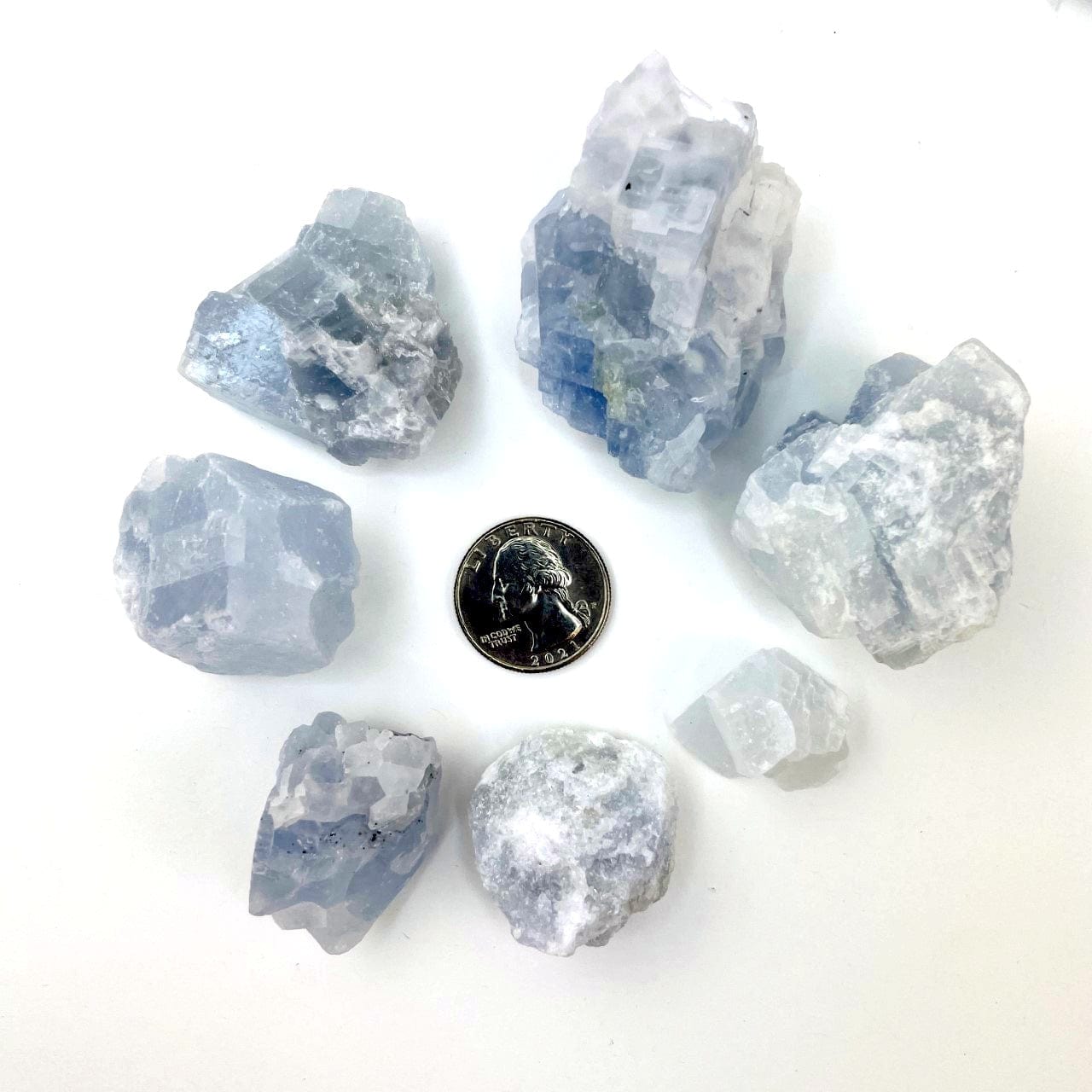 Celestite Stones around a quarter to show sizes