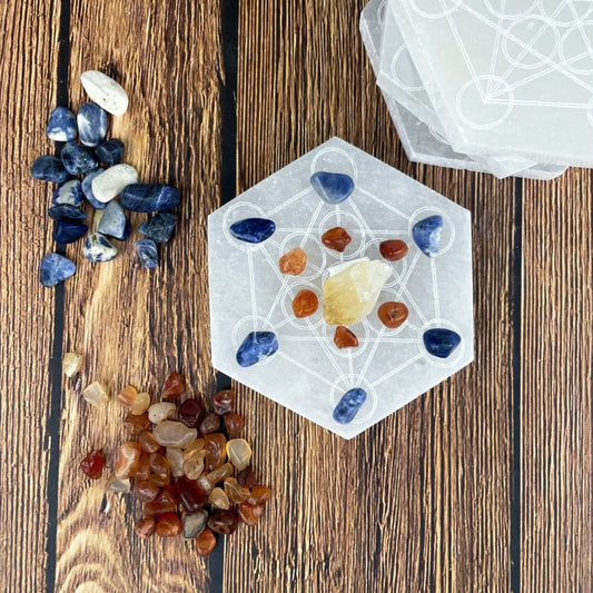 selenite hexagon engraved with metatron symbol with charging stones on engraving