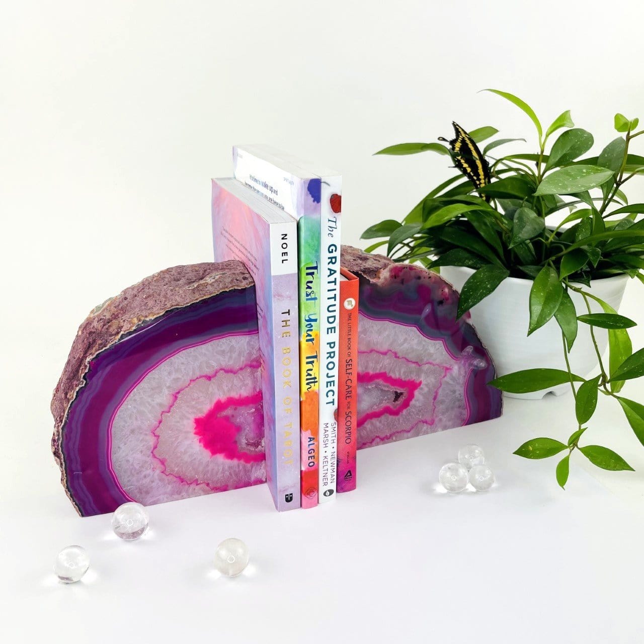Pink agate bookend pair on a white background.