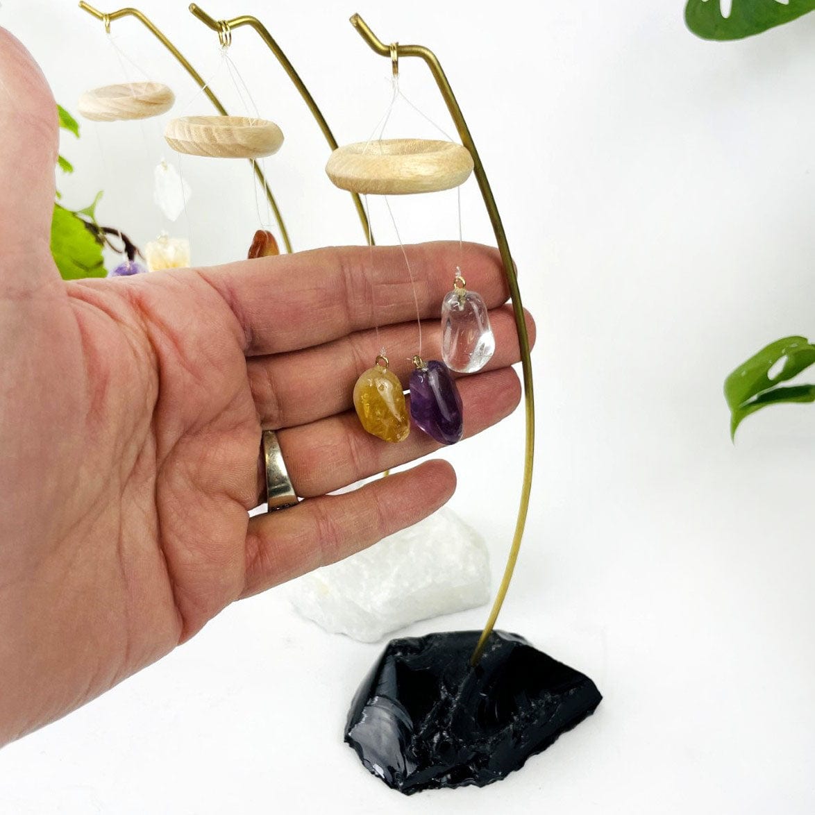 hanging stones in hand for size reference