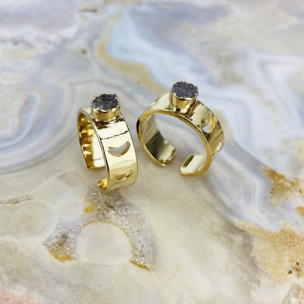 moon phase druzy rings on agate background