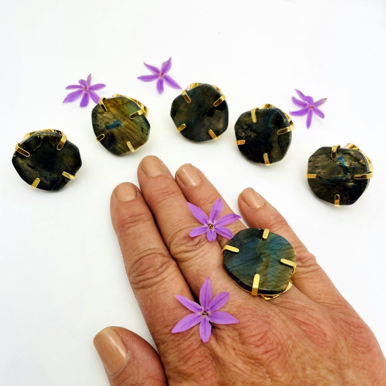 Labradorite Stone Adjustable Ring in Electroplated Gold displayed on hand for size reference