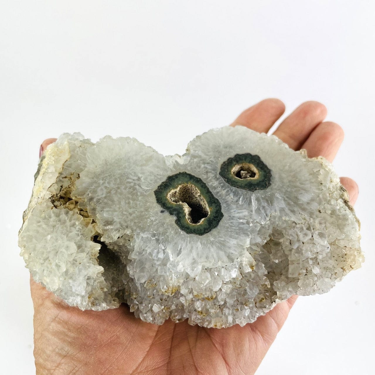 a white Bulk Lot 4 Amethyst Stalactite Druzy Cluster Geode up close