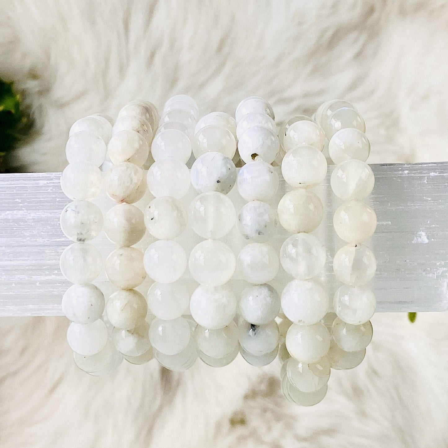 moonstone bracelet - 7 on a piece on selenite