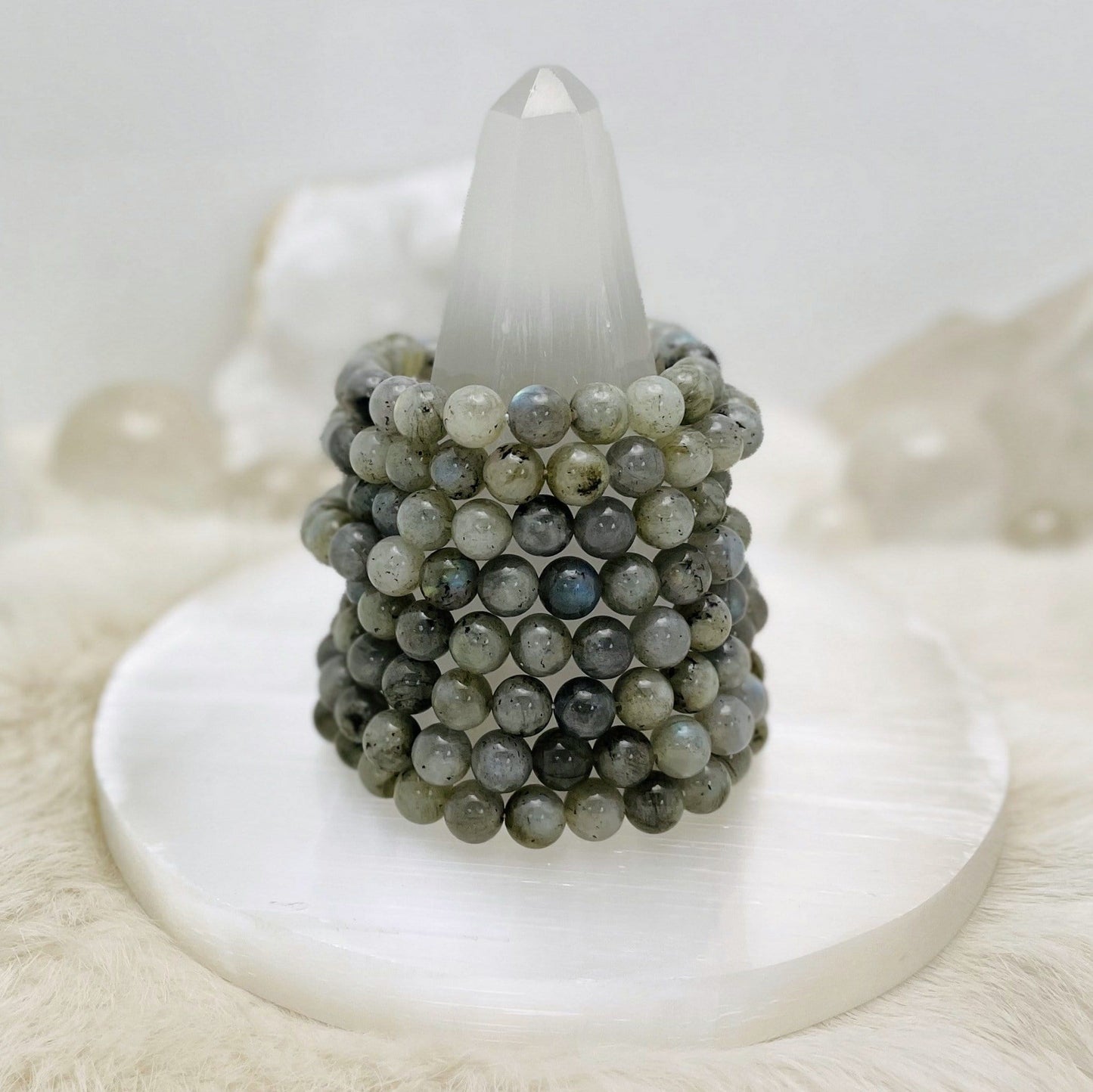 labradorite bracelets with decorations in the background