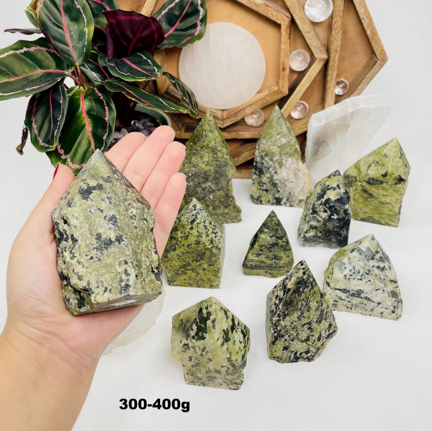 300-400g sized Jadeite Semi-polished Point displayed in hand.