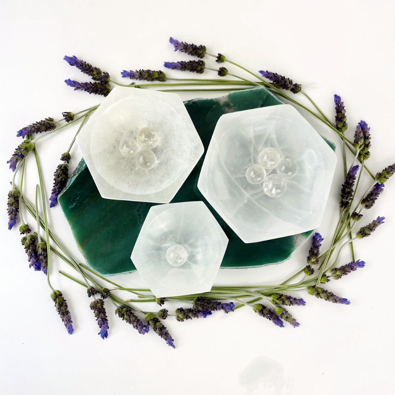 hexagon selenite bowls on display for size comparison