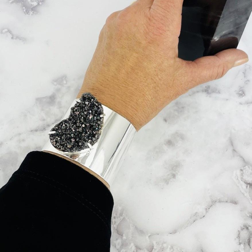 silver bracelet cuff on wrist to view how it fits on wrist