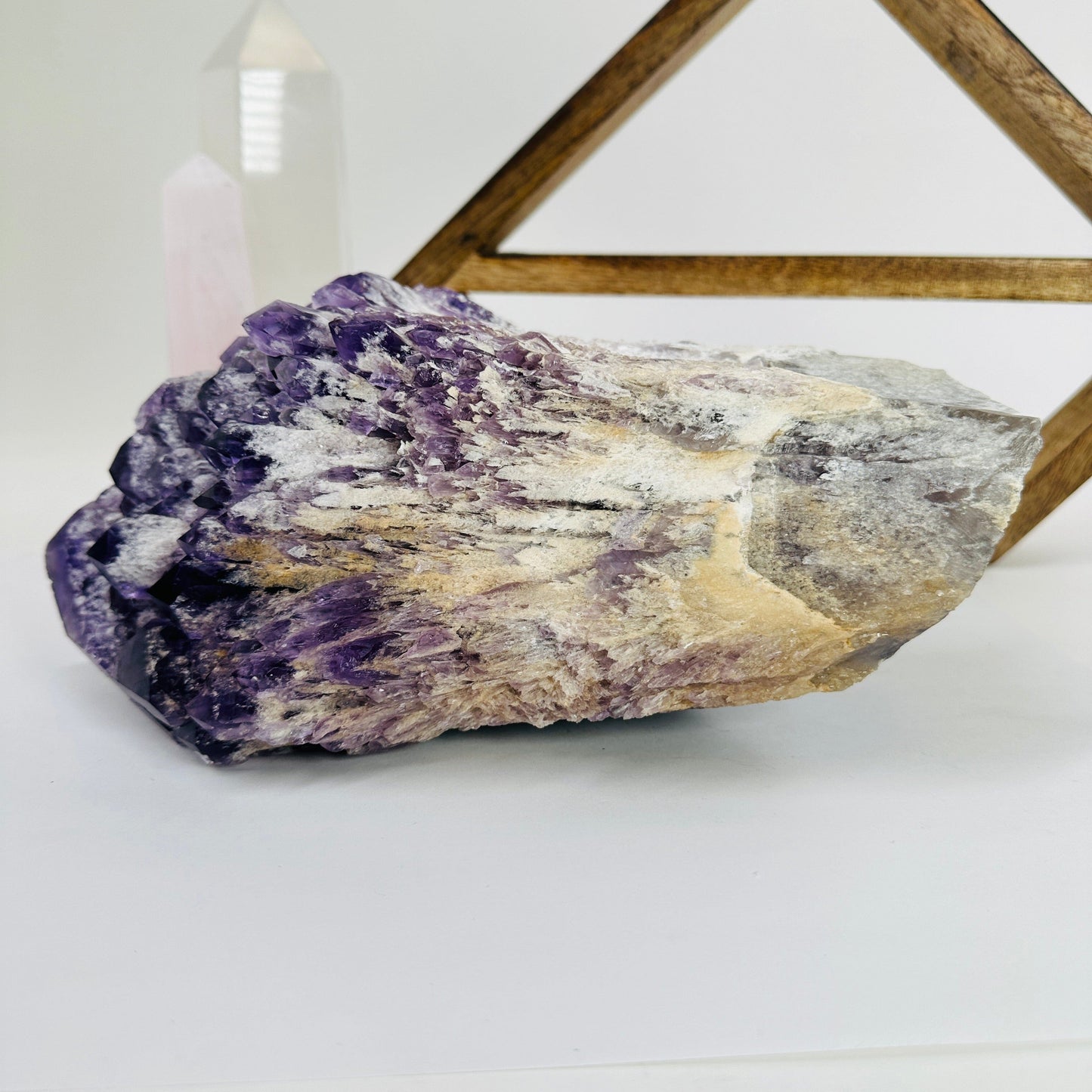 elestial amethyst with decorations in the background