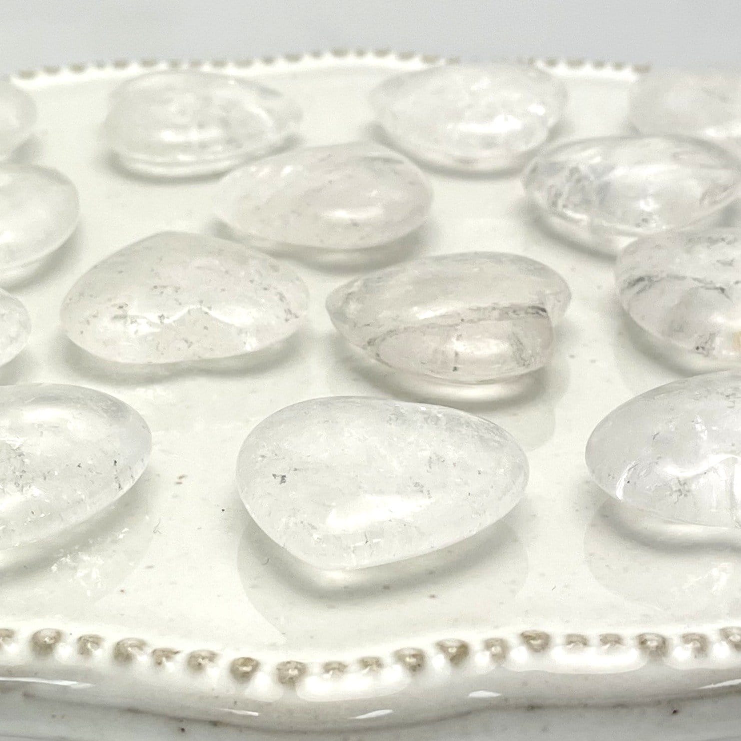 side view of crystal quartz hearts to show thickness