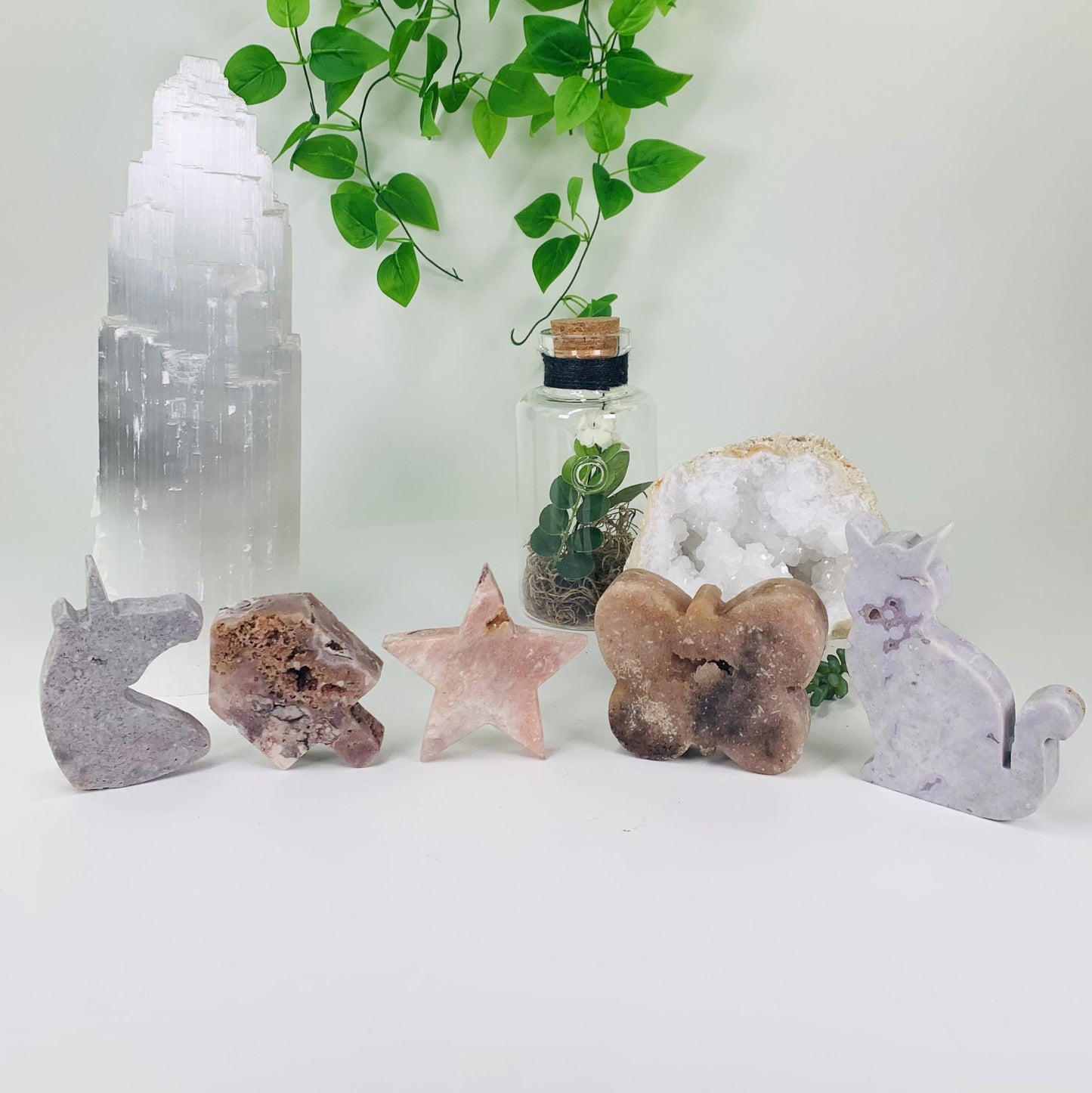 Picture of all 5 Pink amethyst shapes standing. 