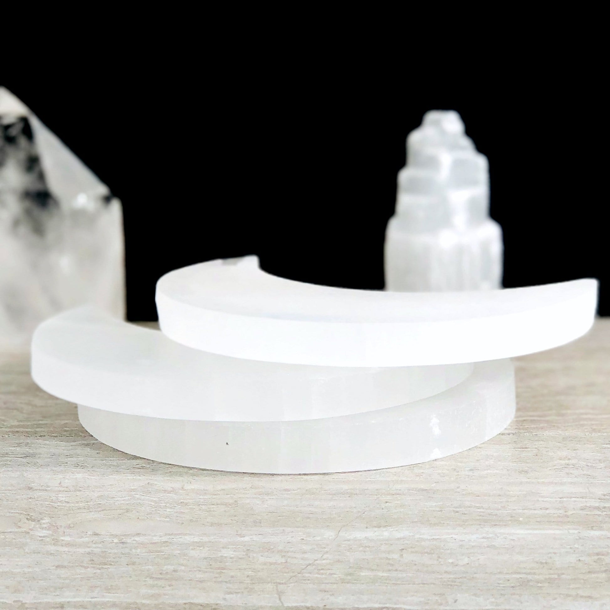 side view of the selenite moons to show the thickness 
