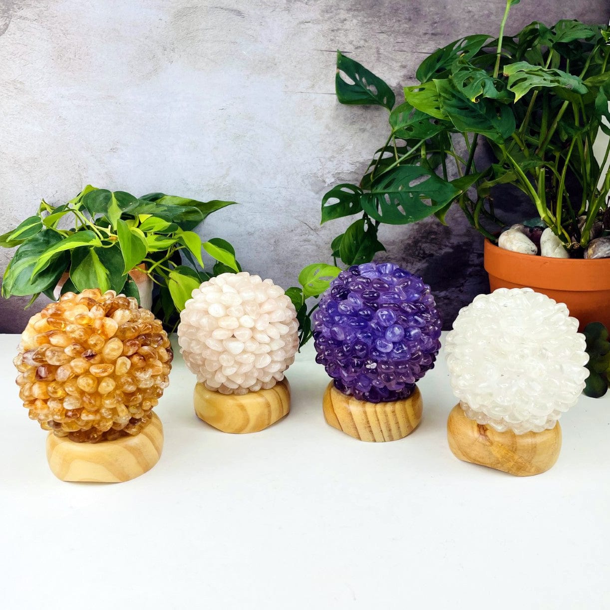 All the tumbled stone lamps, displayed, showing the opytions available: Citrine, Rose quartz, amethyst, crystal quartz