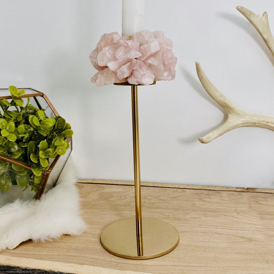 Rose Quartz Taper Candle Holder next to terrarium on table