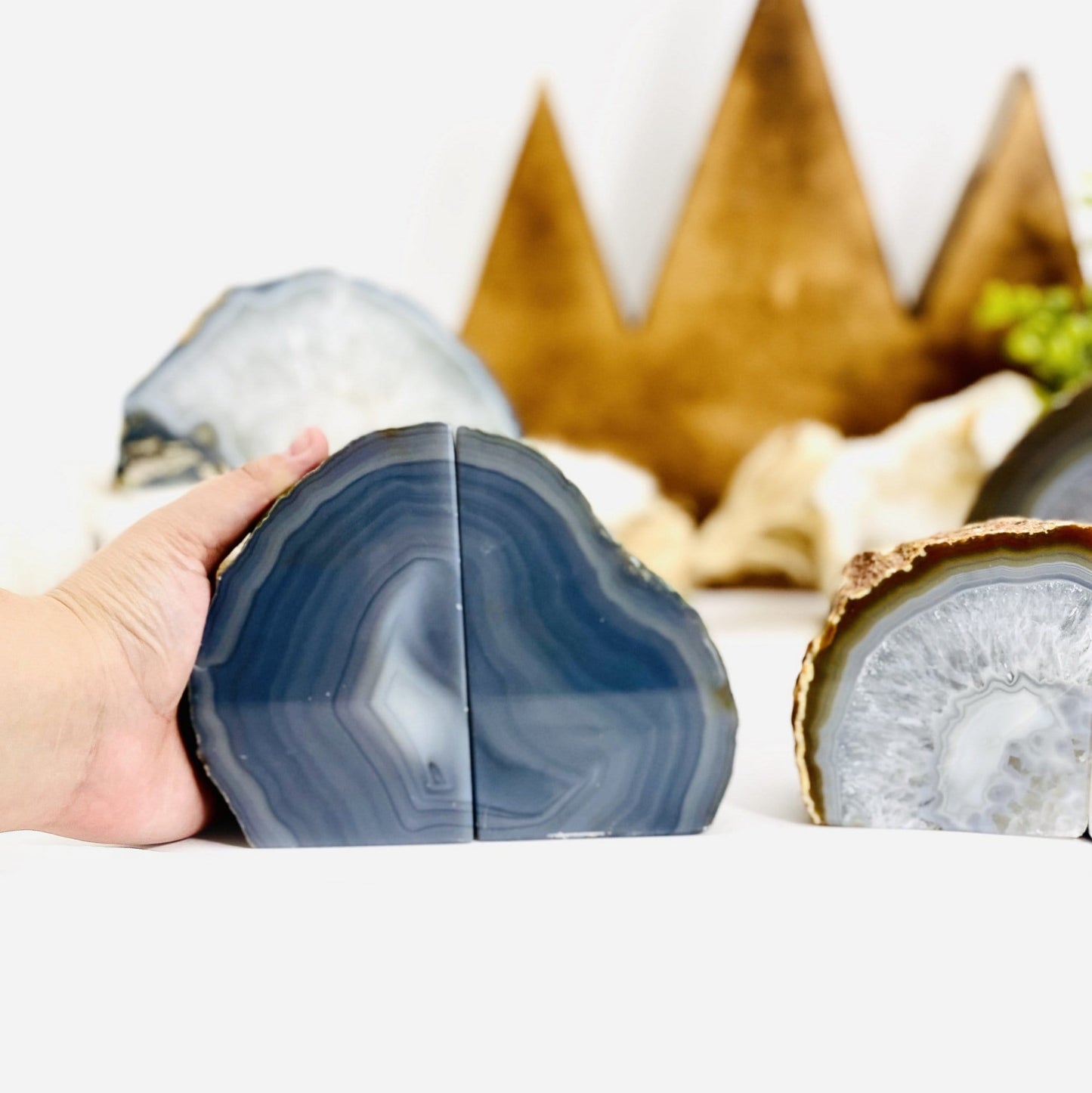 Natural Agate Bookend Pair - 3 to 6 lb  -  with hand around one side