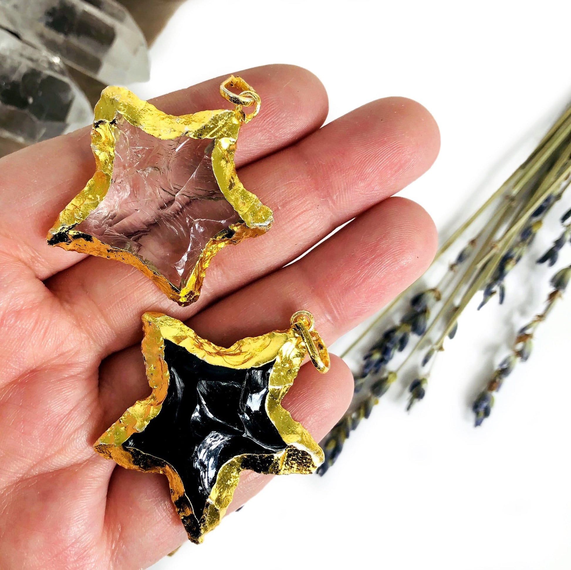 star electroplated pendants with decorations in the background