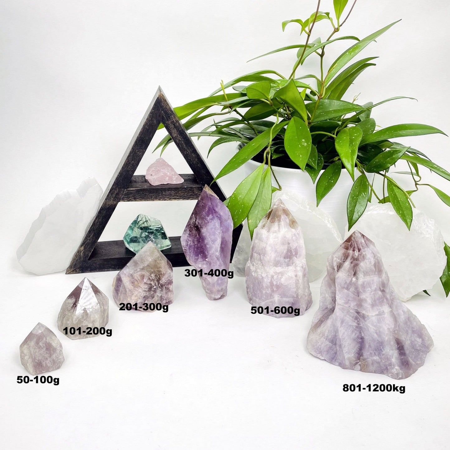 seven minerals in one polished points showing weight in grams 