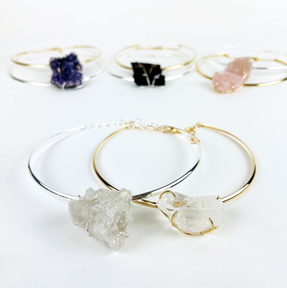 Crystal Cluster choker in gold and silver up close with others options in background