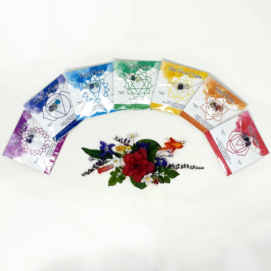 chakra themed three stone adjustable bracelet available in gold or silver 
